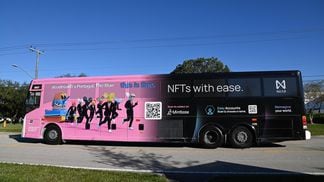 The artists rolled into Miami with a wrapped bus touting their new NFT project. (Eli Tan/CoinDesk)