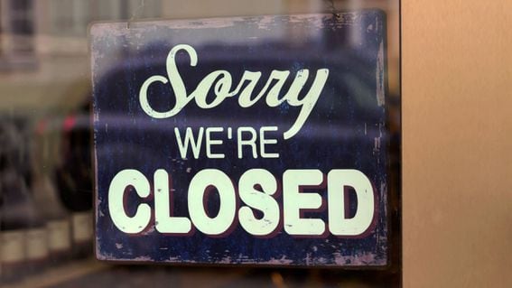 Store sign saying "Sorry we're closed"