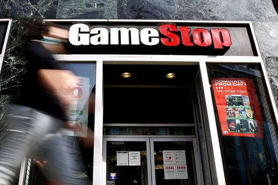 NEW YORK - NEW YORK - MARCH 23: A man passes by GameStop at 6th Avenue on March 23, 2021 in New York. GameStop stocks falls more than 10% after the video game store showing  strong earnings but lower than expected. (Photo by John Smith/VIEWpress)