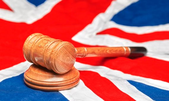 Union Jack Flag with gavel (Peter Dazeley/Getty Images)