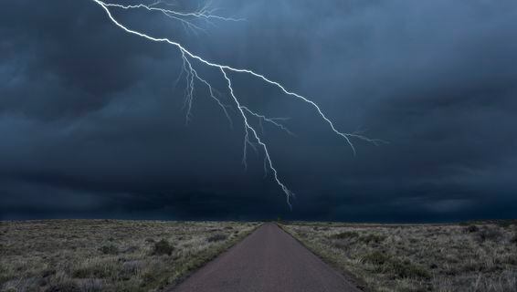 Lightning strikes over the roadway to Bitcoin scalability.