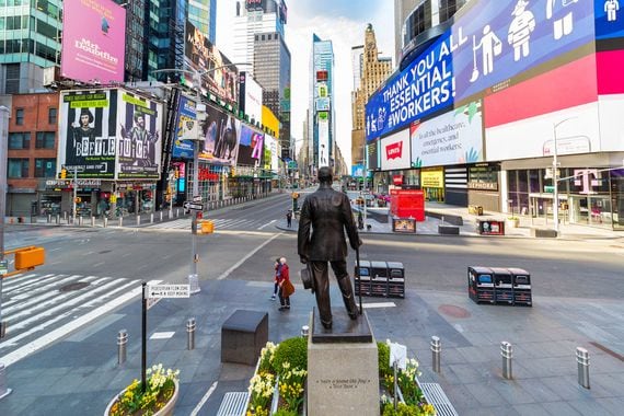 Manhattan, New York, USA - April 12, 2020: No crowds in Times Square after self-quarantine and social distancing was put in place in New York City to slow the spread of the Covid-19 pandemic.