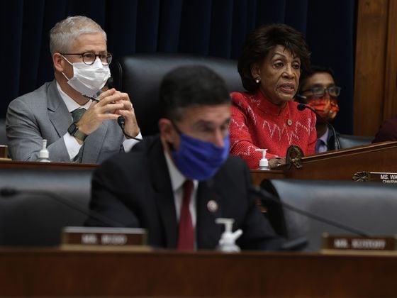 CDCROP: Committee Chair Rep. Maxine Waters (D-CA) (3rd L) speaks as ranking member Rep. Patrick McHenry (R-NC) (L) listens during a hearing before House Financial Services Committee at Rayburn House Office Building on Capitol Hill (Alex Wong/Getty Images)