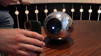 The Worldcoin Orb scans a QR code to kick off the iris scan in Paris. (Eliza Gkritsi/CoinDesk)