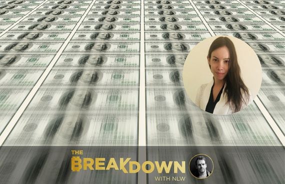 Sheets of 100 dollar bills swooshing by, as if coming off a printer. Lyn Alden talks about money printing, bitcoin, and more.