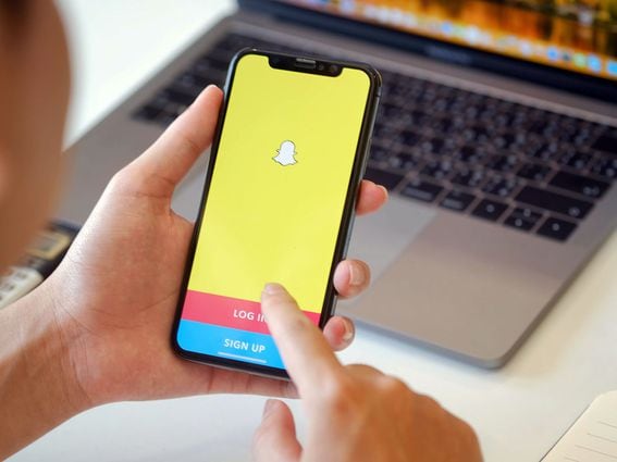CDCROP: Snapchat on a mobile smartphone (Shutterstock)