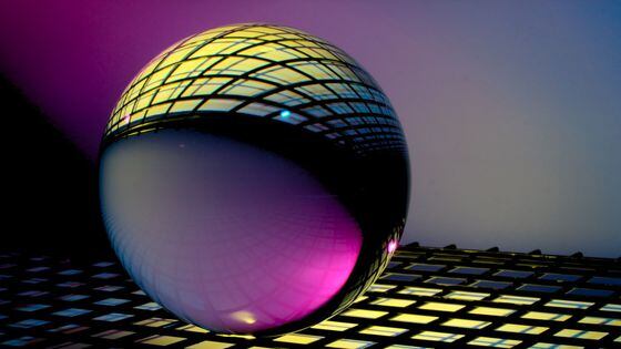 Glass orb with patterns (Michael Dziedzic/Unsplash)