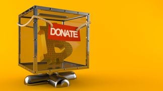 Bitcoin symbol inside donation box (Getty Images)