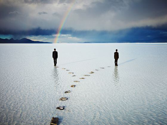 CDCROP: Two men on forked pathway in water under rainbow (Thomas Barwick/Getty Images)