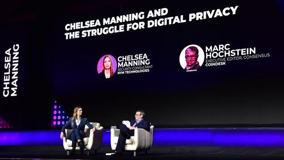 U.S. government whistleblower and Nym Technologies consultant Chelsea Manning discusses cryptography and cryptocurrency on stage at Consensus 2023 with CoinDesk Executive Editor Marc Hochstein. (Shutterstock/CoinDesk)