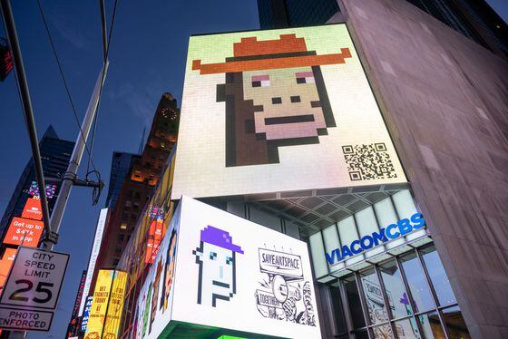 A CryptoPunk digital art NFT on a billboard in Times Square, New York City, in May 2021. (Alexi Rosenfeld/Getty Images)