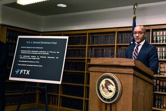 The US Department of Justice unveiled charges against Sam Bankman-Fried on Dec. 13. (Stephanie Keith/Getty Images)