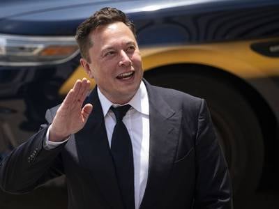 Elon Musk once again tweets his support for DOGE. (Al Drago/Bloomberg via Getty Images)
