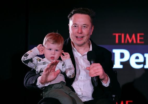 Elon Musk and son X Æ A-12 at Time's Person of the Year event.