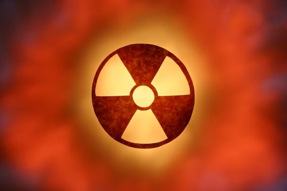 Glowing radioactive symbol, representing risk in Atomic crypto wallet