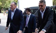 Sam Bankman-Fried, middle, walks into court on Aug. 11, 2023. (Victor Chen/CoinDesk)