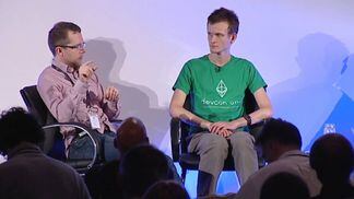Christian Lundkvist and Vitalik Buterin (right) speak at Devcon 1. (Ethereum Foundation/YouTube)