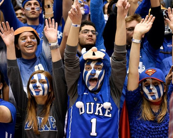 Fans of the Duke Blue Devils cheer on their basketball team.