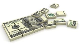 CDCROP: Illustration of a stack of $100 bills broken in squares (Getty Images)