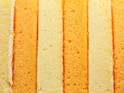 striped orange chiffon cake representing monero, cake wallet and Unstoppable Domains