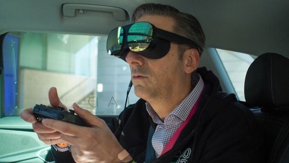 The Holoride system uses an HTC Vive Flow to bring a VR experience to cars, minus the motion sickness. (Pete Pachal/CoinDesk)