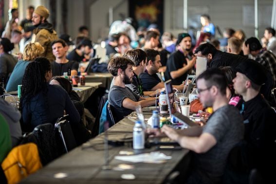 People at work in the developer area of the main venue of ETHDenver 2022. (Chet Strange/Bloomberg via Getty Images)